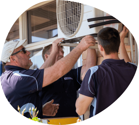 professionals air con installers putting up air con on wall bracket